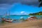 Traditional filippino boat in sea water of tropical lagoon. Palawan island hopping tour. Tourist cruise in sunny seaside