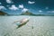 Traditional filippino fishing boat in shallow water lagoon at El Nido bay. Palawan island, Philippines