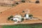 Traditional Finca on Mallorca Majorca farm with windmill landscape scenery aerial view in Spain