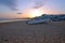 Traditional fisherman boat on the beach in Armacao de Pera Portugal at sunset