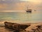 Traditional Fisherman`s Dhow boat anchored at sunset