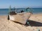 Traditional fishing boat on the Algarve beach - Portugal