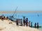 Traditional fishing boats on beach with locals, Madagascar