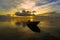 Traditional fishing boats with coastal fishing village. Beautiful scenery morning sunrise over sea in Labuan,Malaysia.