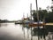 A traditional fishing boats parked on the jetty river in the morning.