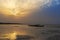 Traditional fishing canoes at the beach in the island of Orango at sunset, in Guinea Bissau.