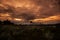 Traditional fishing tool or bamboo fish trap on sunset light, landscape silhouette