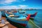 A traditional fishing village with colorful boats lined up along the shore