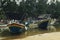 Traditional fishing village with lovely sky and fishing boat moored near the shore