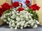 Traditional flowered balcony at the Alps and Dolomites. Colorful flowers on balcony. Summer time. Mix of flowers and colors