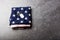 Traditional folded of America United States flag and tag