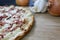 Traditional food called `Tarte Flambee` or `Flammkuchen` from German-French Alsace border region