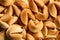 Traditional fortune cookies as background, closeup view