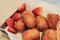 Traditional French beignets doughnuts with strawberry and powdered sugar.