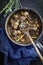 Traditional French boeuf bourguignon with vegetable in a design bowl