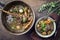 Traditional French boeuf bourguignon with vegetable farmhouse bread in a design bowl