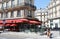 The traditional French cafe brasserie Royal Opera with unidentified clients .It is located near National Opera house in