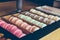 Traditional french colorful macarons in a cafe. Sweet food close up, bakery, store.