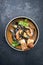 Traditional French Corsican seafood stew with prawns and mussels in a modern design bowl