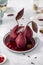 Traditional french dessert pears stewed in red wine