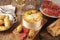 Traditional french dish- cheese fondue, mont d`or