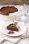 Traditional French tarte au chocolat cake on a classic white plate