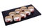 Traditional fresh japanese sushi on black stone Warm Roll Escolar on a white background. Roll ingredients: escolar fish,