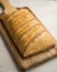 Traditional Galician empanada filled with vegetables and anchovies.