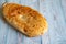 Traditional Georgian lavash bread on blue background