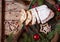 Traditional German Christmas cake Stollen with Marzipan, Nuts Berries and Raising. Holiday xmas celebration decorations.