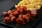 Traditional German currywurst sausages with Curry spice on wursts