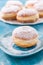 Traditional German Krapfen, Berliner or donuts with icing sugar