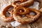 Traditional German salted pretzel bread macro on the table. Hori