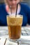 Traditional greek cold coffee Frappe made from water, instant coffee and ice cubes