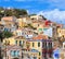 Traditional greek colorful houses in Symi island. Dodecanese, Greece.