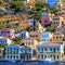 Traditional greek colorful houses in Symi island. Dodecanese, Greece.