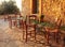 traditional greek country outdoor restaurant on terrace with empty table, Crete, Greece.