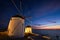 Traditional greek windmills on Mykonos island at sunrise, Cyclades, Greece