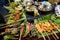 Traditional grilled fish and chicken sticks. Street food, Laos.