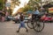 Traditional hand pulled indian rickshaw driver working on the street in Kolkata, West Bengal, India