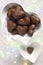 Traditional handmade gingerbread heart cookies with filling chocolate glazed on bright lighted background