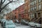 Traditional Harlem Neighborhood in New York City. Beautiful Colored Houses. Road with Parked Cars. Urban Street Photography