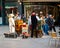 Traditional hawker in the bustling commercial street of Cologne