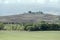 Traditional hilltop farm in Orcia valley, near Castelvecchio, Siena, Italy