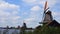 Traditional Holland Windmills in Zaanse Schans, Netherlands. Touristic Village near the Amsterdam with the windmills and