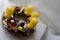 Traditional home made advent wreath with yellow candles and dried decorative elements
