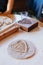 Traditional home-made gingerbread baking. Wooden pressed gingerbread heart. Budapest, Hungary