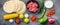 Traditional homemade taco ingredients with meat,salsa, peppers, tomatoes, avocado , corn, tortilla over grey background, top view