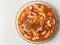 traditional hot dish also called seblak food contains mie, macaroni, sausage, and egg