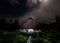 Traditional house Mentawai tribe in the jungle at night.